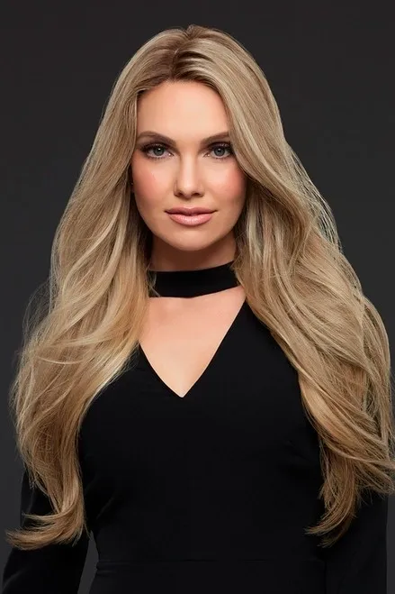 A woman in a black dress with long blonde hair.